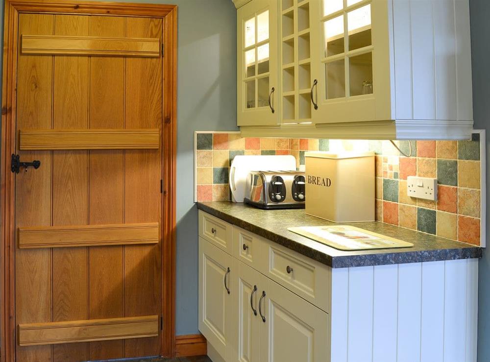 Farmhouse style kitchen with separate utility room at Chalgrove in Soar, near Brecon, Powys, Wales