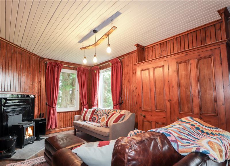 Relax in the living area at Challenger Bothy, Lairg