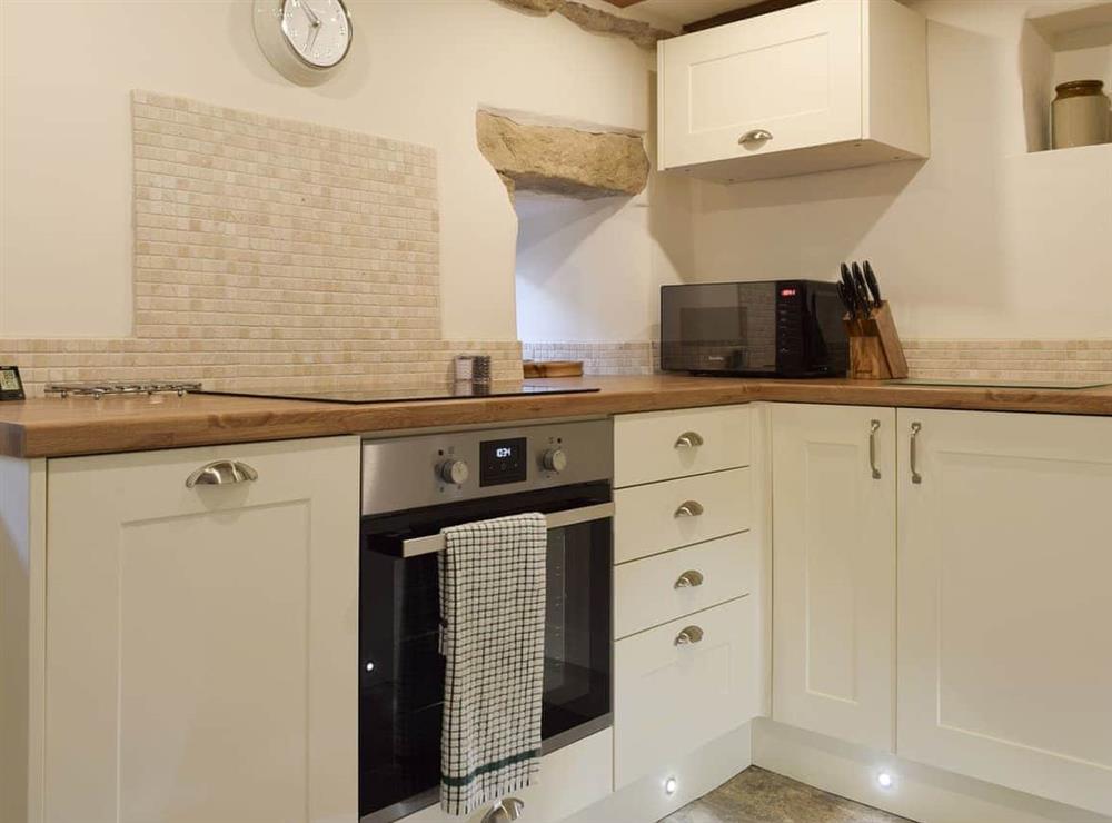 Well-equipped fitted kitchen at Chamber End Fold in Grassington, near Skipton, North Yorkshire