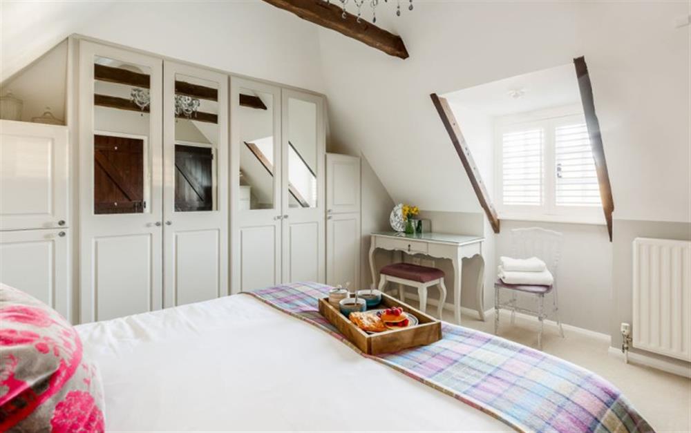 This is a bedroom at Chamberlains Cottage in Brockenhurst
