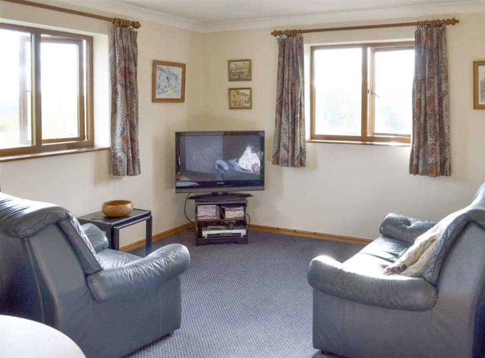 Cosy living area at Champernowe in Dartington, Totnes, Devon