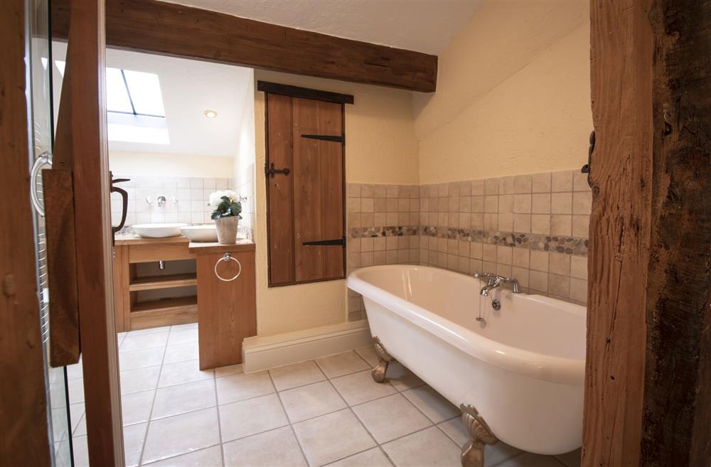 Chance Cottage, North Yorkshire: Spacious family bathroom with a sumptuous roll-top bath and separate shower