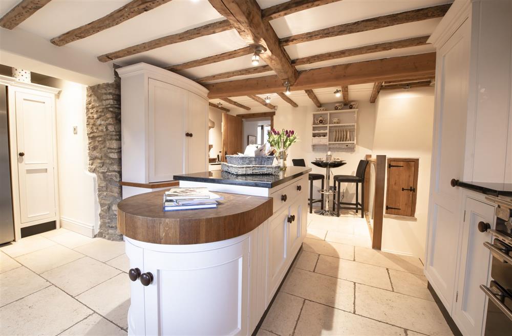 Chance Cottage, North Yorkshire: The well-equipped kitchen with small stairway down to the lower ground floor