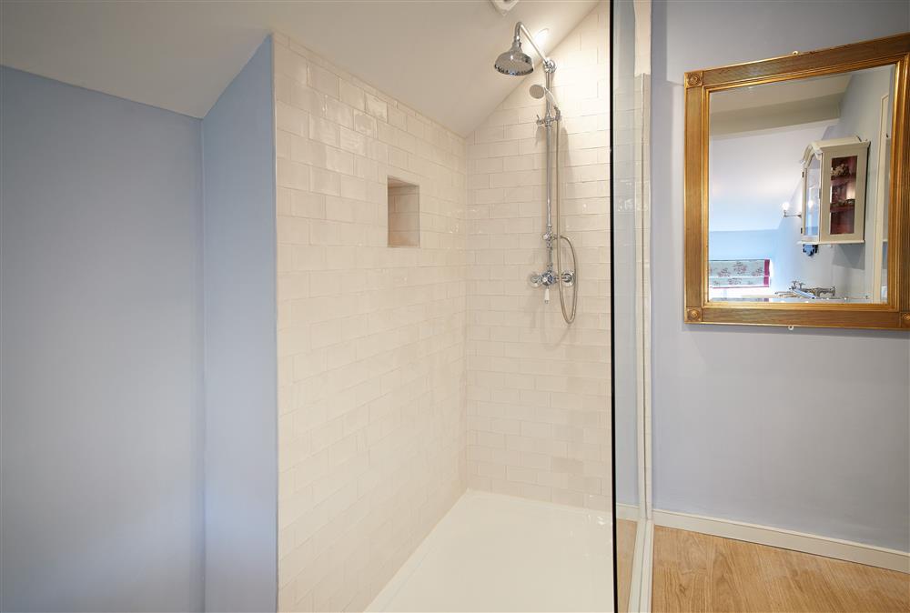 Bathroom walk-in shower cubical with rain shower at Chanting Hill Farmhouse, Castle Howard Estate, Welburn