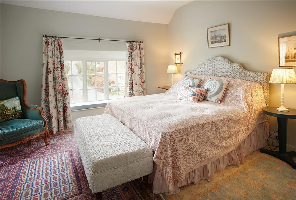 Bedroom one with 6’ super-king size bed at Chanting Hill Farmhouse, Castle Howard Estate, Welburn
