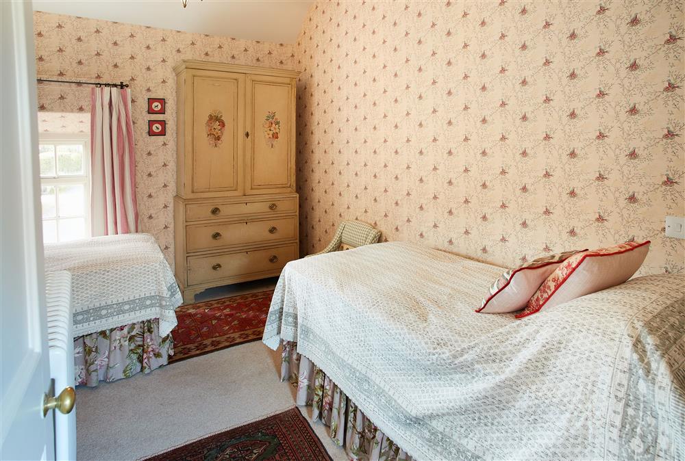 Bedroom three with twin 3’ single beds at Chanting Hill Farmhouse, Castle Howard Estate, Welburn