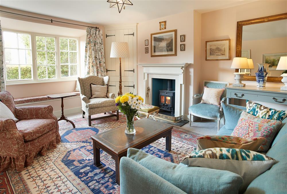 Spacious sociable sitting room with plenty of seating at Chanting Hill Farmhouse, Castle Howard Estate, Welburn