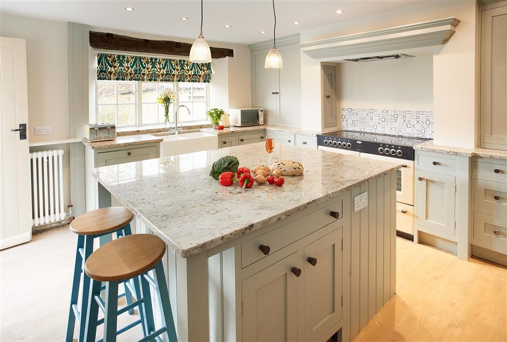 Well-equipped farmhouse kitchen with modern appliances at Chanting Hill Farmhouse, Castle Howard Estate, Welburn
