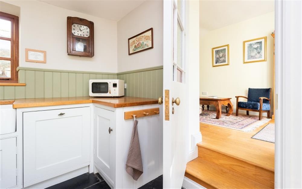 Kitchen leading to living area at Chantry Cottage in Chard