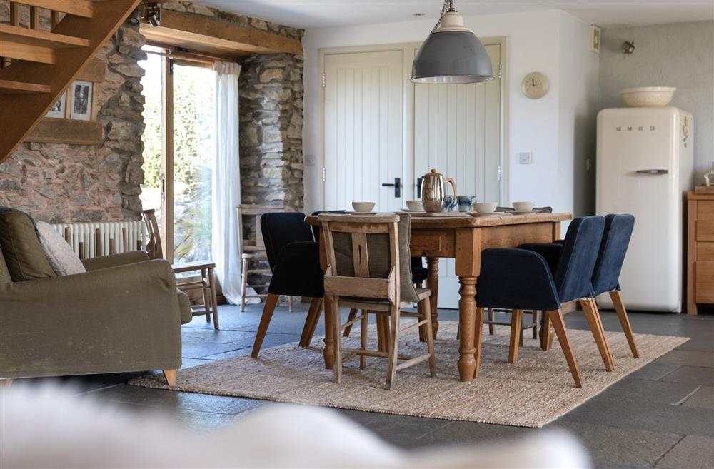 The dining table with French doors onto the patio