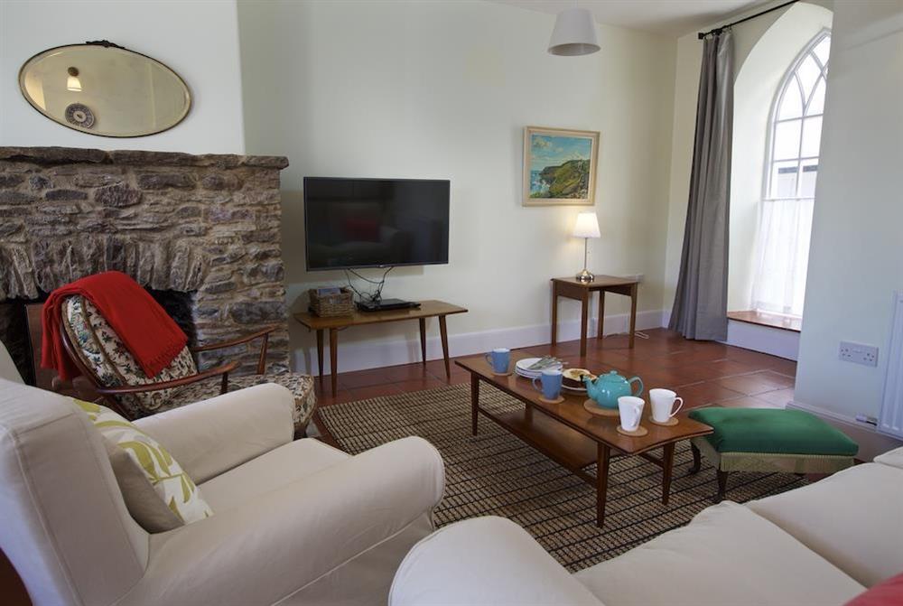 Sitting room with two sofas, chairs and TV at Chapel House in , Dartmouth