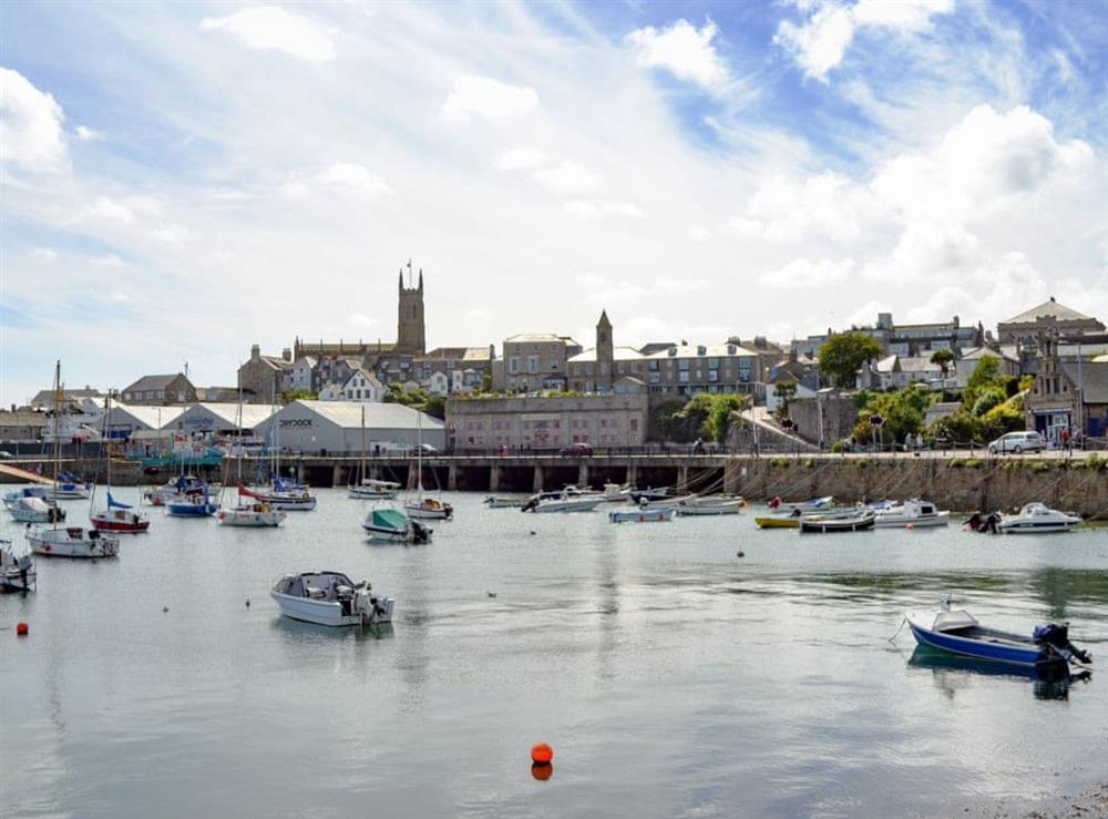 Chapel Street is immediately in front of the church, overlooking the harbour at Chapel Street in Penzance, Cornwall