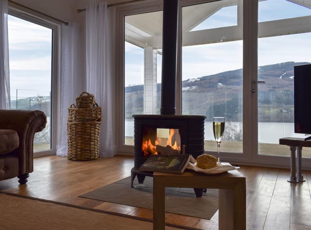 Living area with stunning views over Loch Tay at Chapelburn in Fearnan, near Aberfeldy, Perthshire