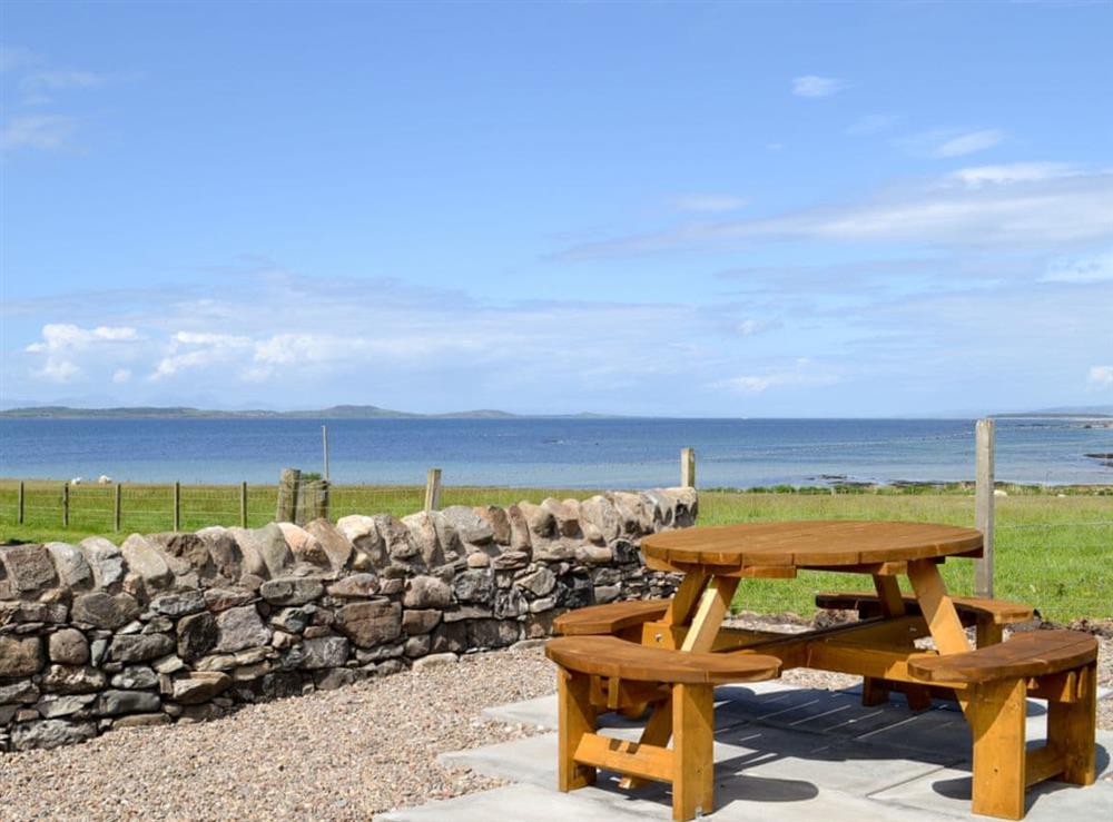 Outdoor seating area with fantastic views at Charlies Cottage in Muasdale, near Campbeltown, Argyll