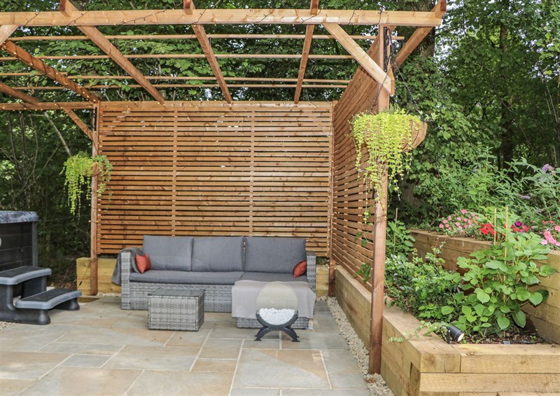 Enjoy the garden at Charltons Hollow Cabin, Bolney