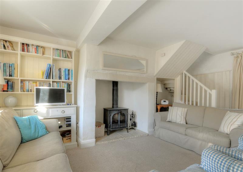 Relax in the living area at Charm Cottage, Charmouth