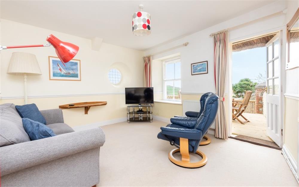 Bright living room at Charmouth House in Charmouth