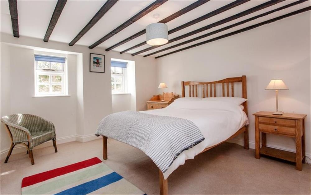 Double bed in bedroom 1 at Charmouth House in Charmouth