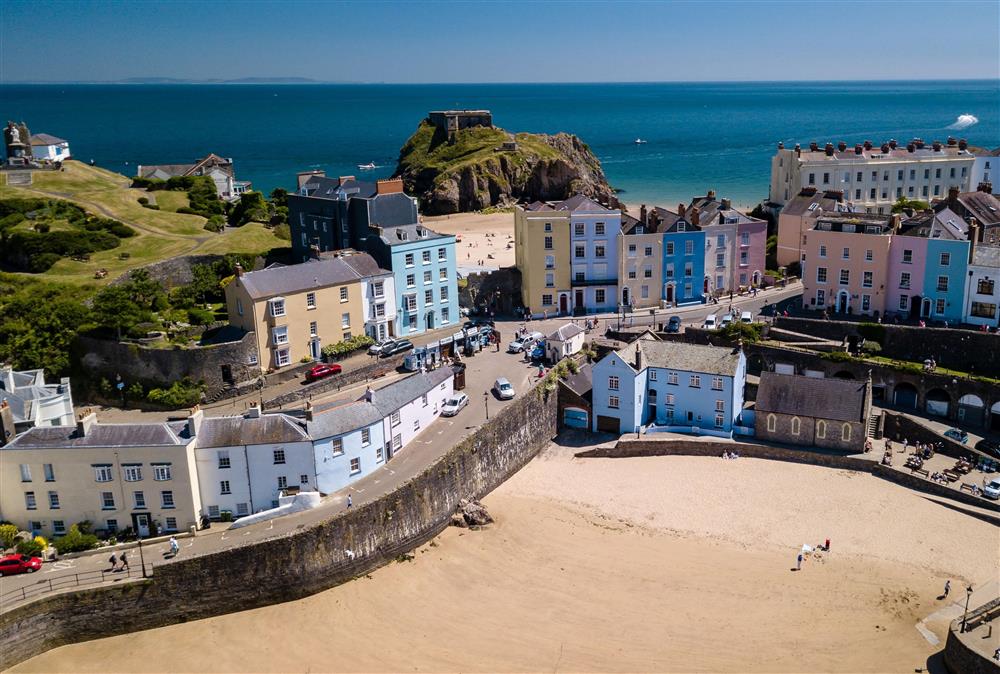 Looking down on the golden sands of Tenby and its pastel coloured houses