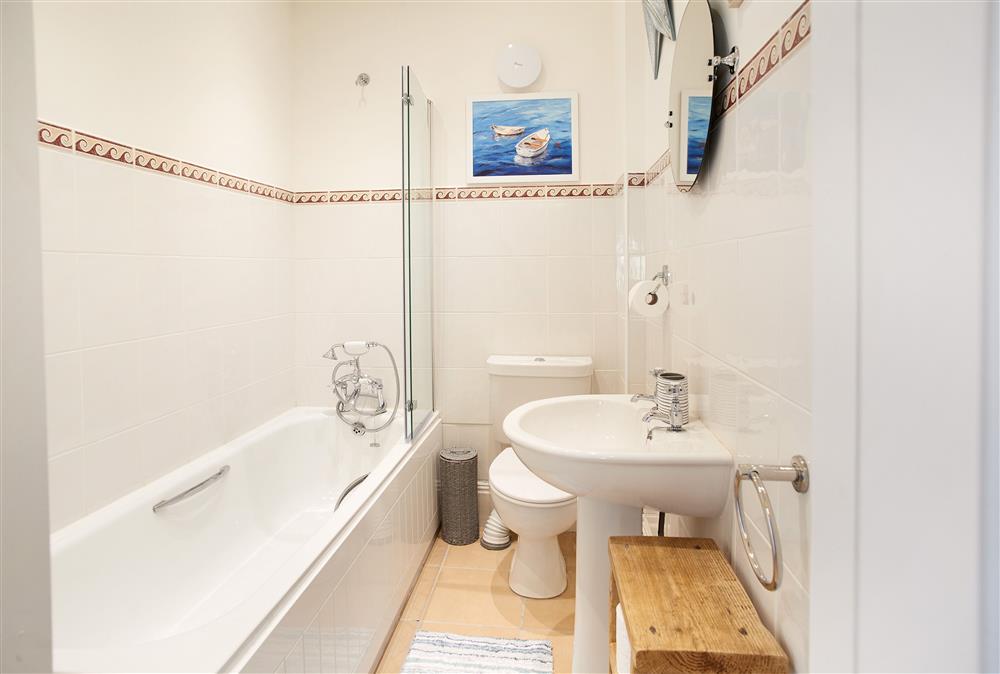 Second floor:  Family bathroom with shower over bath  (photo 2) at Chart House, Tenby