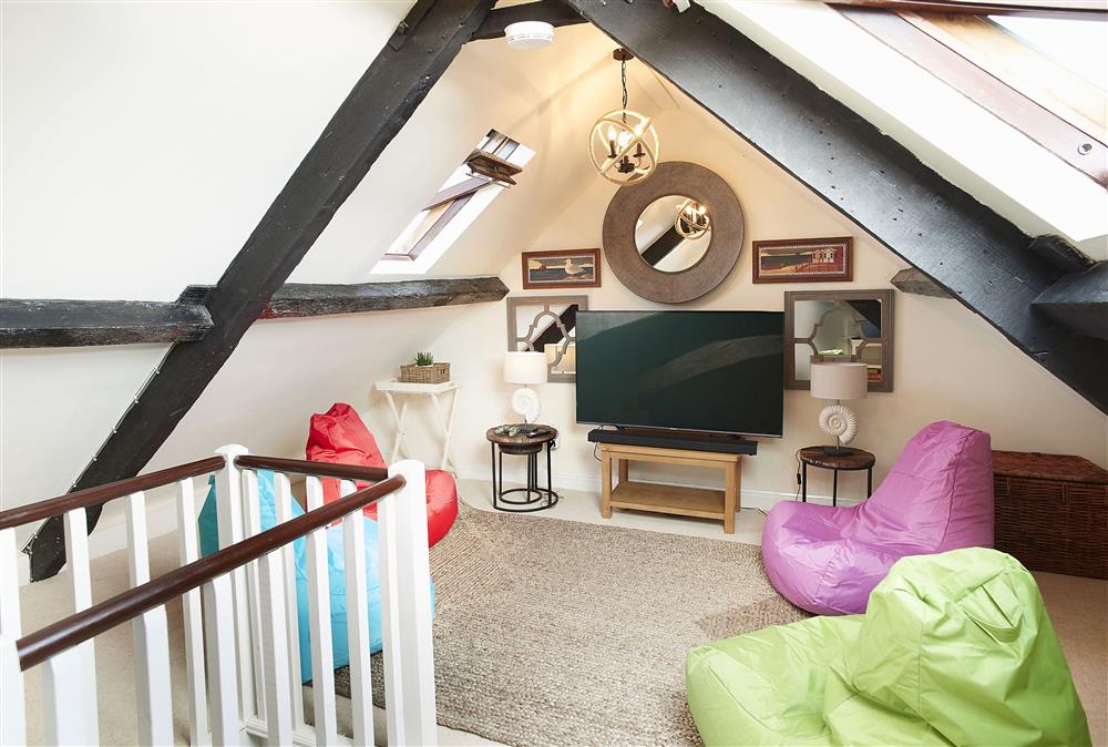 Top floor: Great chill out room with bean bags, television and games console, the ideal escape for our younger guests after a day on the beach (photo 2)
