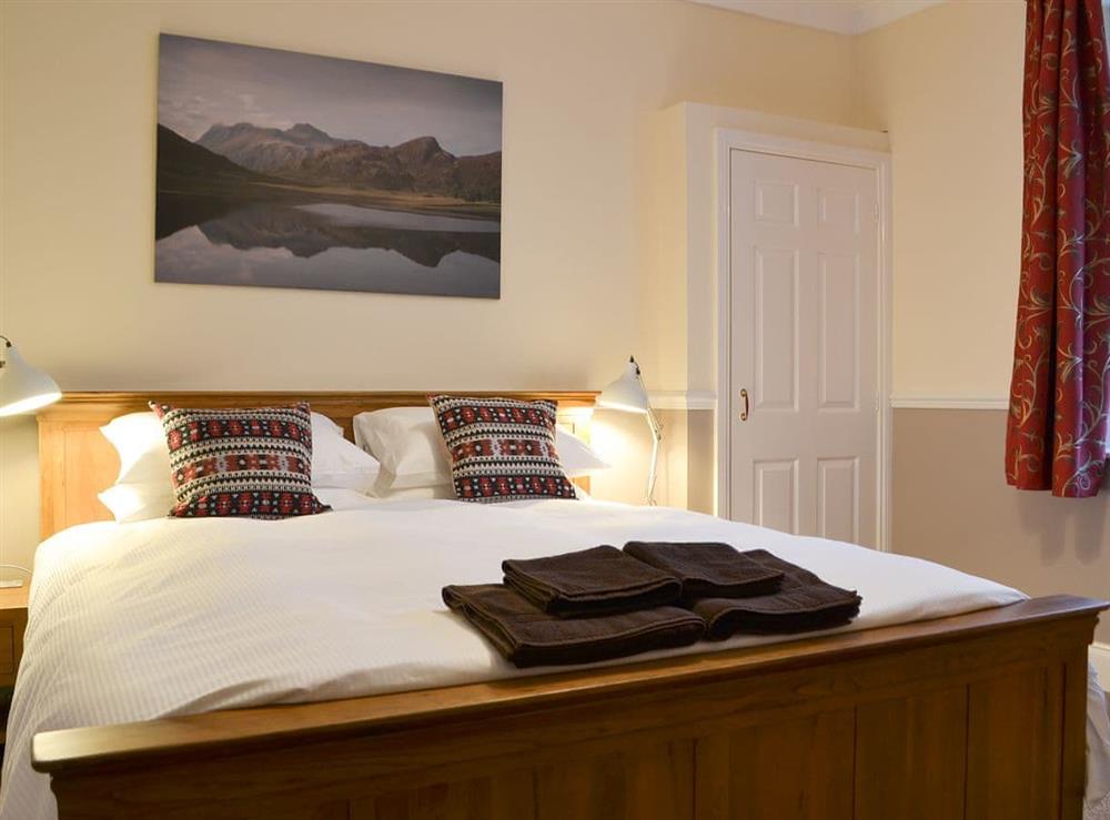 Warm and inviting double bedroom at Chartfield in Windermere, Cumbria