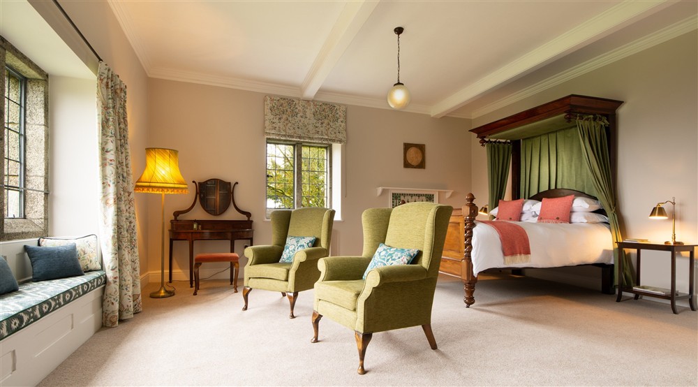 The double bedroom with canopy bed and en-suite bathroom at Chatham in Falmouth, Cornwall