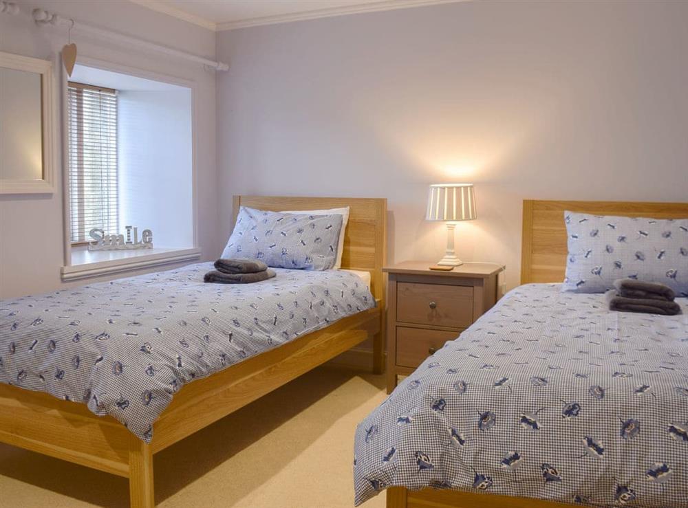 Comfy twin bedroom at Cheery Nook in Penrith, Cumbria