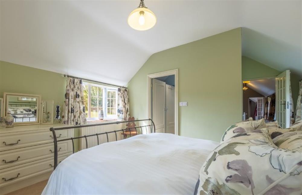 First floor: King-size bedroom with Jack-and-Jill  shower room at Cheney Hollow (4), Heacham near Kings Lynn