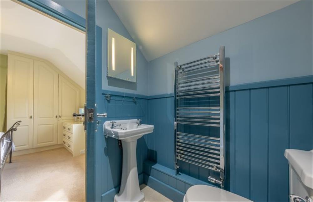 A shared ’Jack-and-Jill shower room between bedrooms two and three at Cheney Hollow, Heacham near Kings Lynn