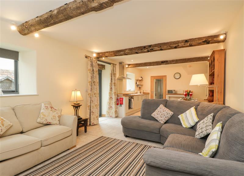 Relax in the living area at Chequers Barn, Corsham