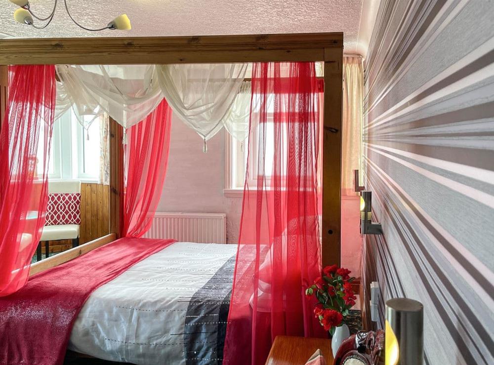 Four Poster bedroom (photo 5) at Cherry Blossom Inn in Blackpool, Lancashire