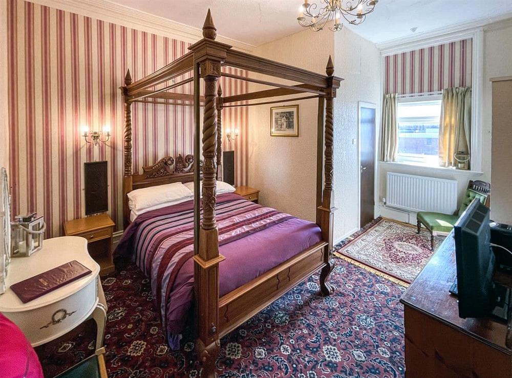 Four Poster bedroom at Cherry Blossom Inn in Blackpool, Lancashire