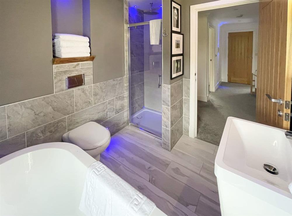 Bathroom with large freestanding bath and walk in drencher shower (photo 2) at Cherry Cottage in Little Salkeld, near Penrith, Cumbria