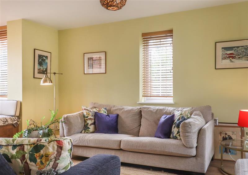 Relax in the living area at Cherry Garden Cottage, Sandhurst