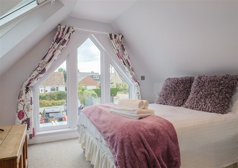 A bedroom in Cherry Pip (photo 2) at Cherry Pip, Charmouth