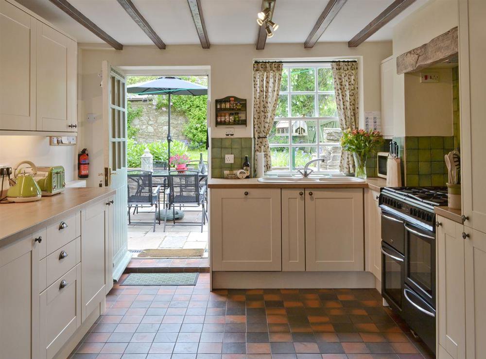 Well-equipped country-style kitchen at Cherry Tree Cottage in Bellerby, Wensleydale., North Yorkshire