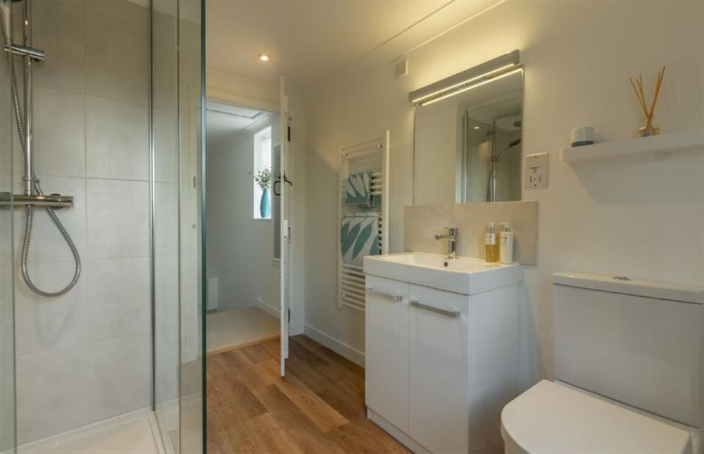 First floor: Family bathroom with walk-in rain forest shower at Cherry Tree Cottage, Great Bircham near Kings Lynn