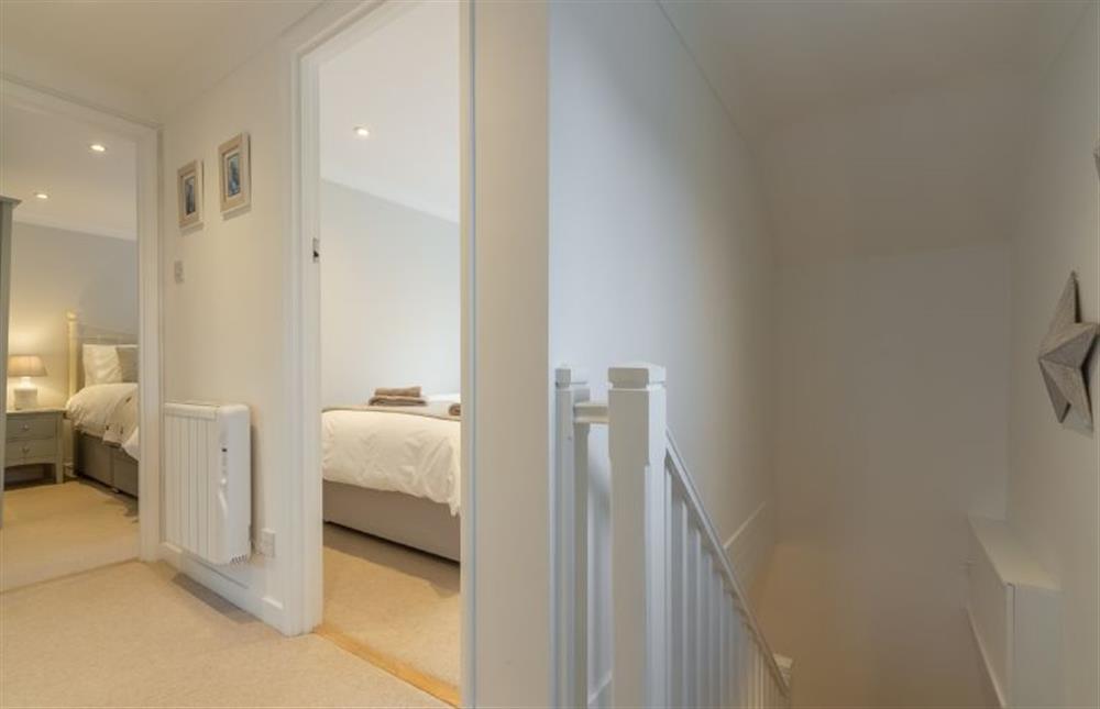 First floor: Landing looking towards double bedroom at Cherry Tree Cottage, Great Bircham near Kings Lynn