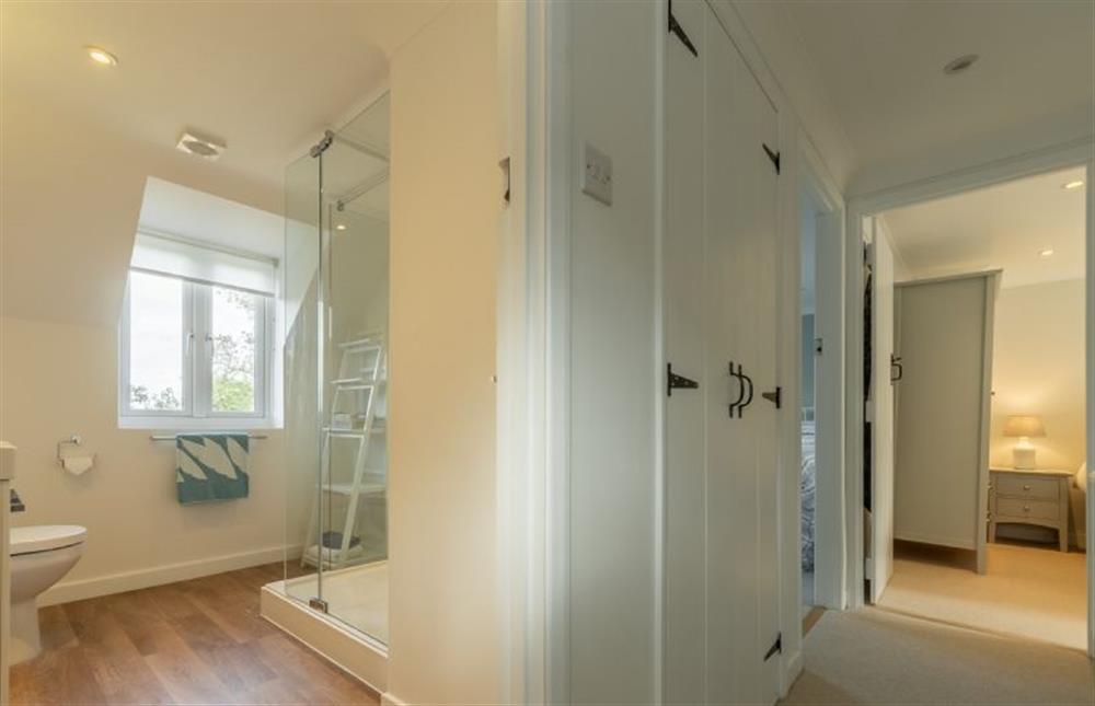 First floor: Landing with view into shower room at Cherry Tree Cottage, Great Bircham near Kings Lynn