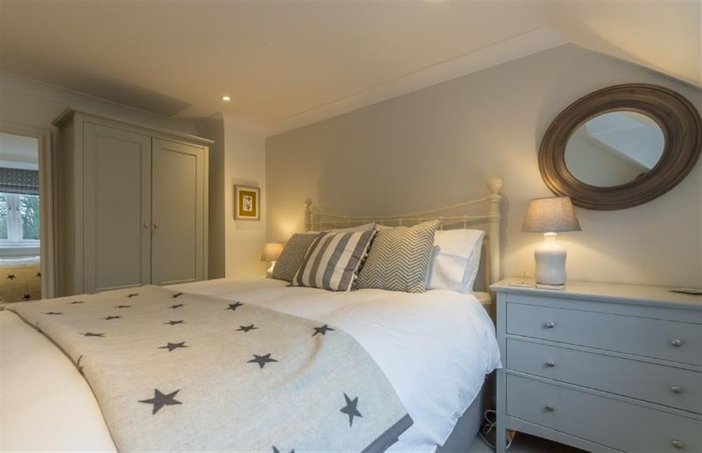 First floor: Master bedroom with king-size bed at Cherry Tree Cottage, Great Bircham near Kings Lynn
