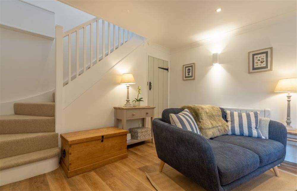 Ground floor: Sitting room with stairs to first floor at Cherry Tree Cottage, Great Bircham near Kings Lynn