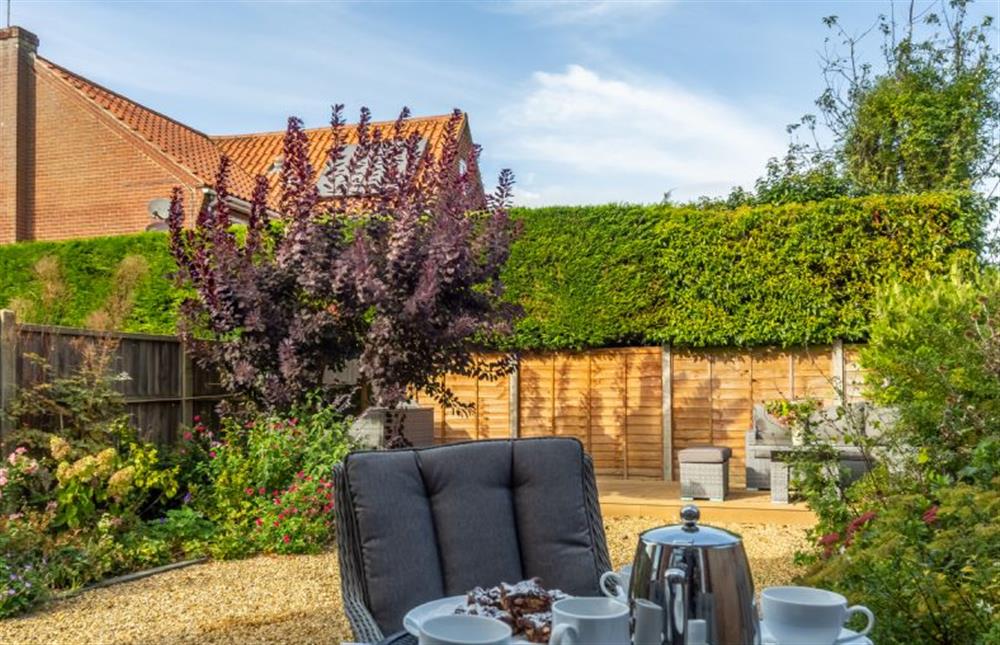 The garden provides the opportunity for alfresco dining at Cherry Tree Cottage, Great Bircham near Kings Lynn