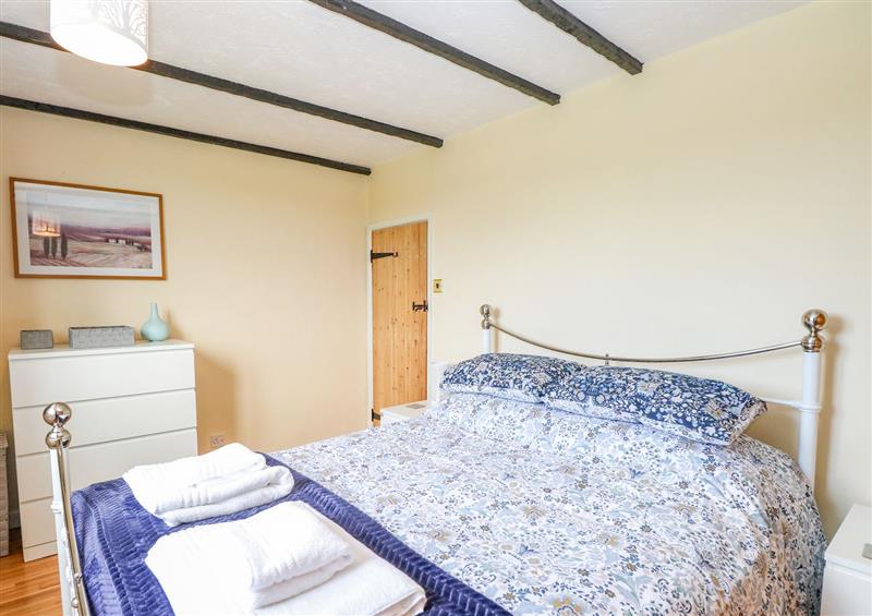 A bedroom in Cherry Tree Cottage at Cherry Tree Cottage, Runham Swim near Filby