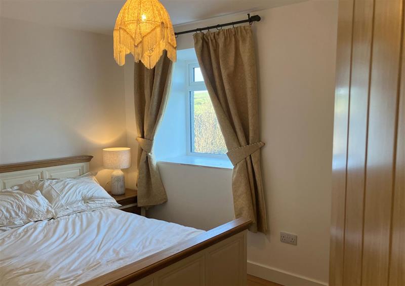 A bedroom in Cherry Tree cottage at Cherry Tree cottage, Sandhead