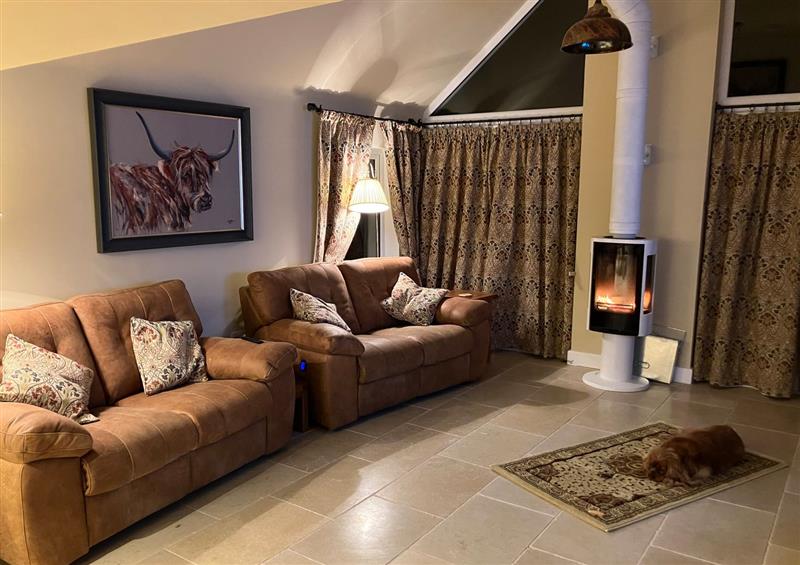 Relax in the living area at Cherry Tree cottage, Sandhead