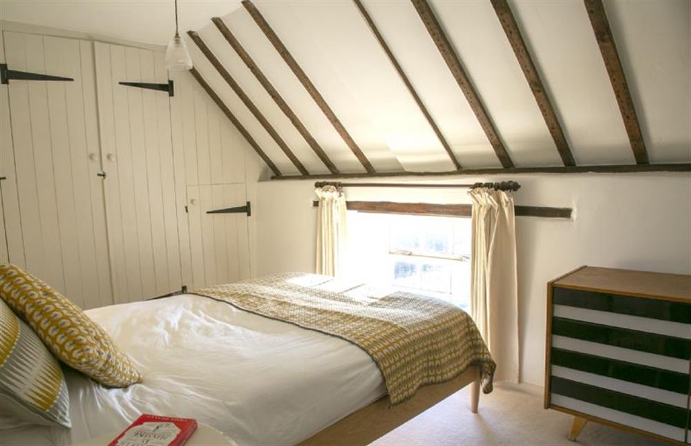 First floor: Master bedroom at Cherry Tree Cottage, Stanhoe near Kings Lynn