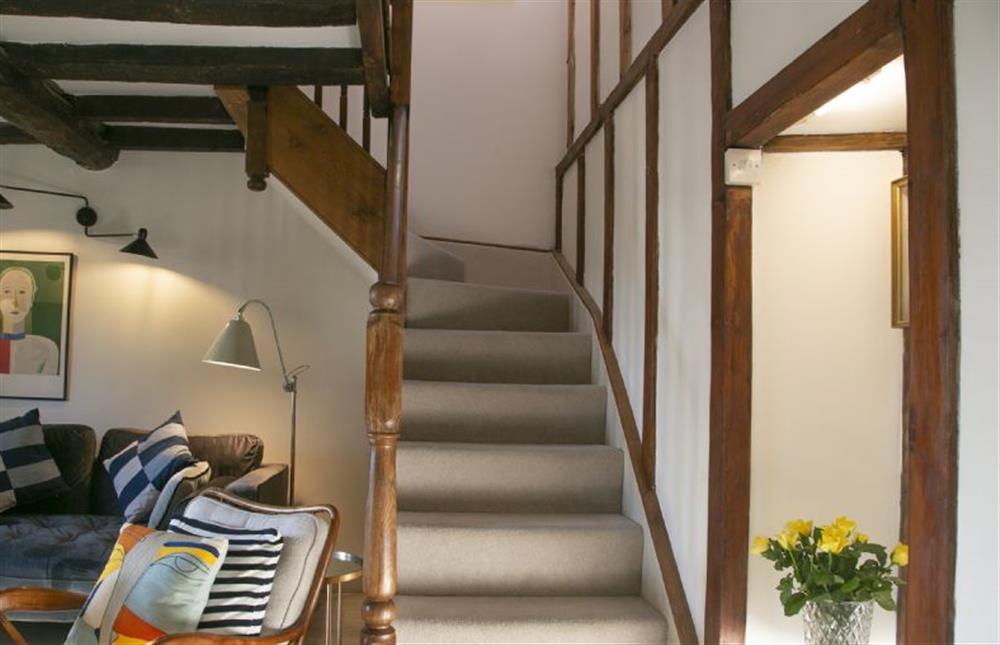 Ground floor: Stairs to the first floor from the sitting room at Cherry Tree Cottage, Stanhoe near Kings Lynn