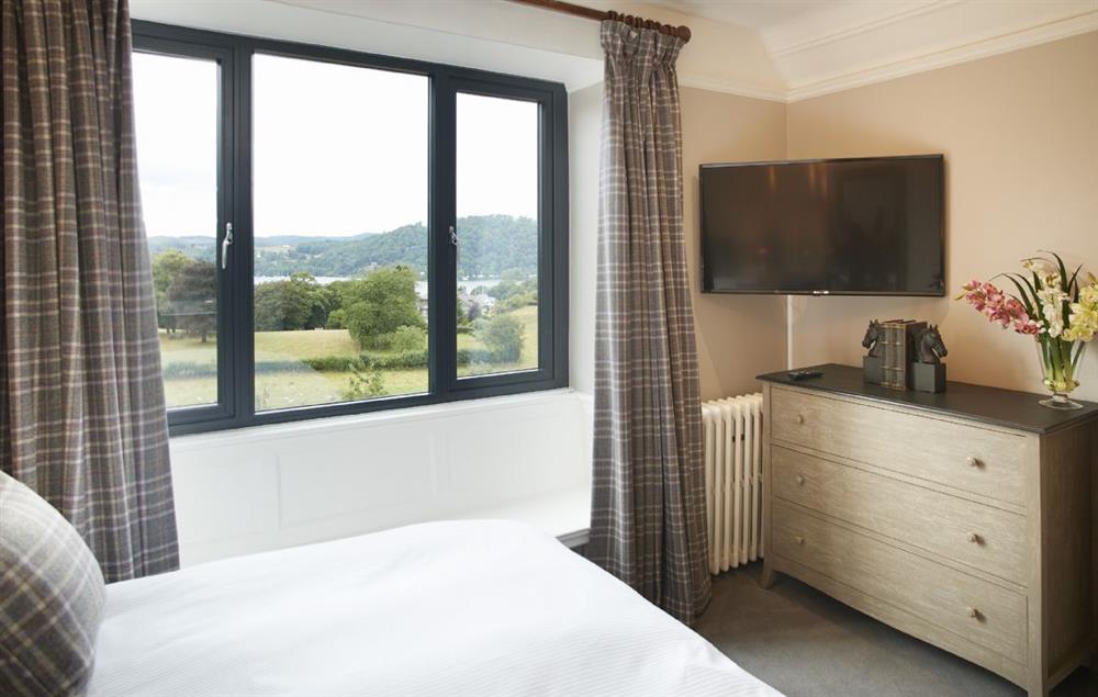 Second bedroom with king size bed, window seat and lake views (photo 2) at Cherry Trees, Bowness-on-Windermere