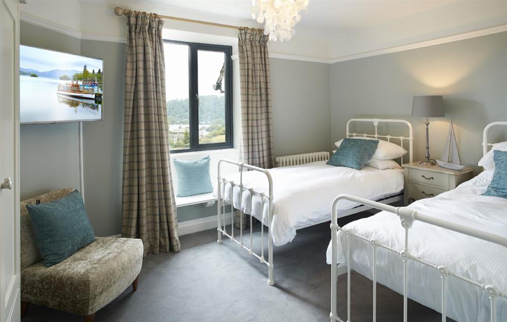 Third bedroom with two 3’ single beds, window seat and lake views at Cherry Trees, Bowness-on-Windermere